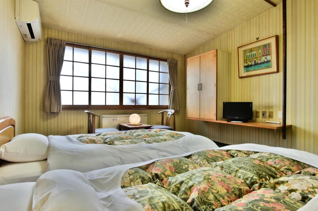Takenoya Ryokan Ōmachi Esterno foto